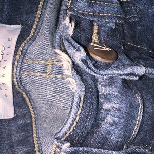 Dark blue ripped jeans from buckle